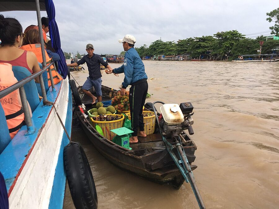 Cai Rang floating market boats trading on the Hau River near Can Tho, Vietnam