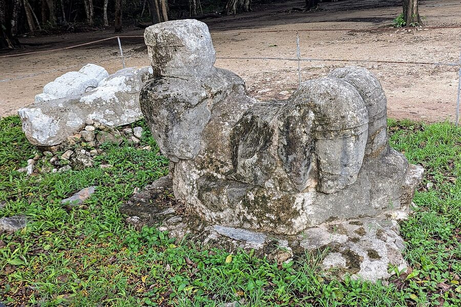 Stone chacmool figure with offering bowl on its stomach at the Temple of the Warriors, Chichen Itza