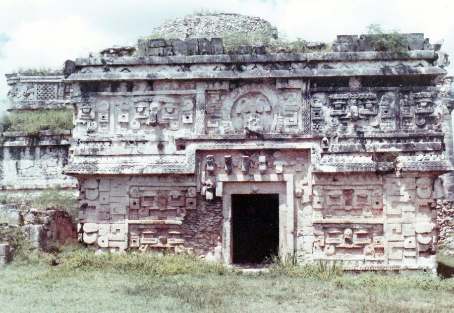 The Las Monjas Annex at Chichen Itza, ornate stucco facade with intricate Maya carvings