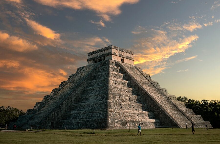 A pyramid at Chichen Itza with surrounding ruins