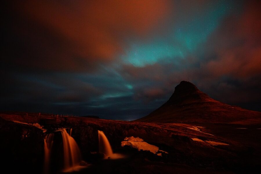 Kirkjufell mountain at night with the foreground waterfall, Iceland
