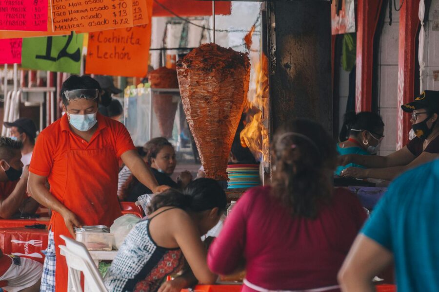 A street market in Merida showing local vendors and food