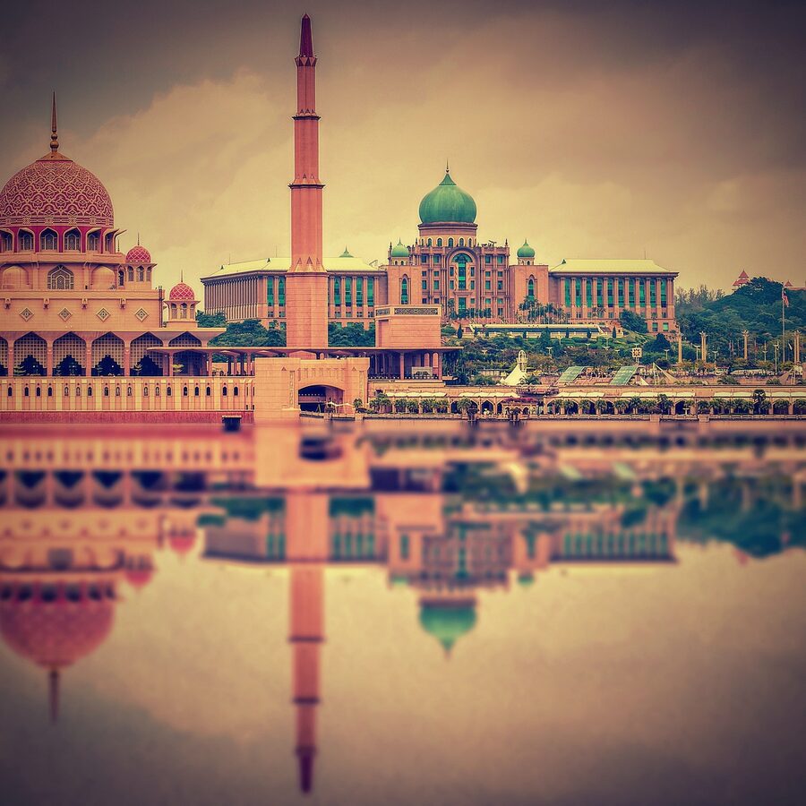 The pink-domed Putra Mosque on the lake at Putrajaya, Malaysia