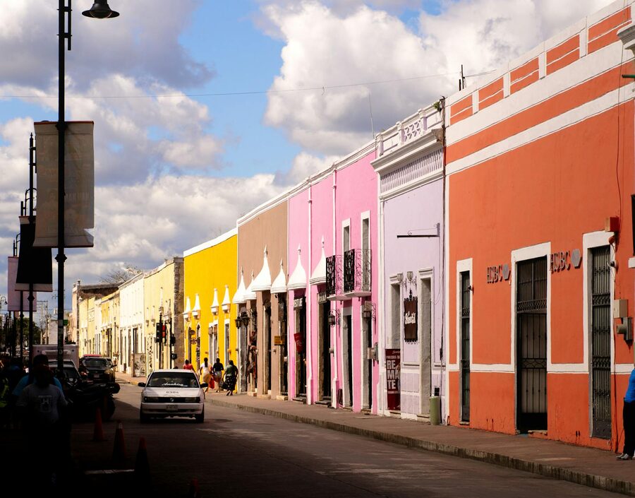 Colonial architecture on a sunlit street in Valladolid, Yucatan, Mexico
